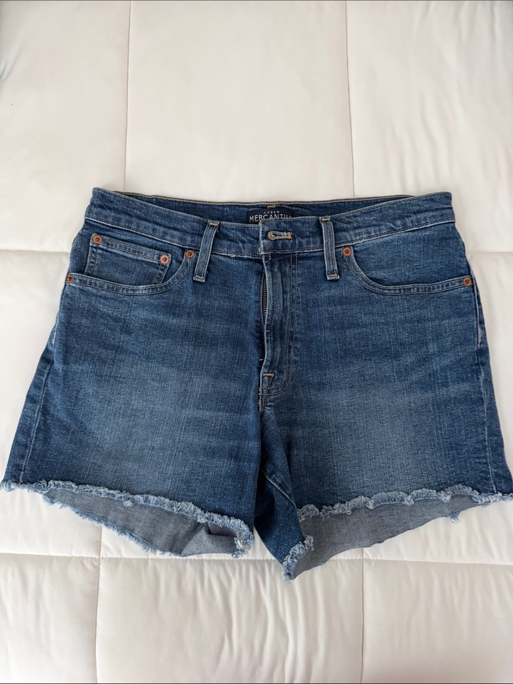 JCrew Distressed High-Rise Denim Shorts in Medium Blue